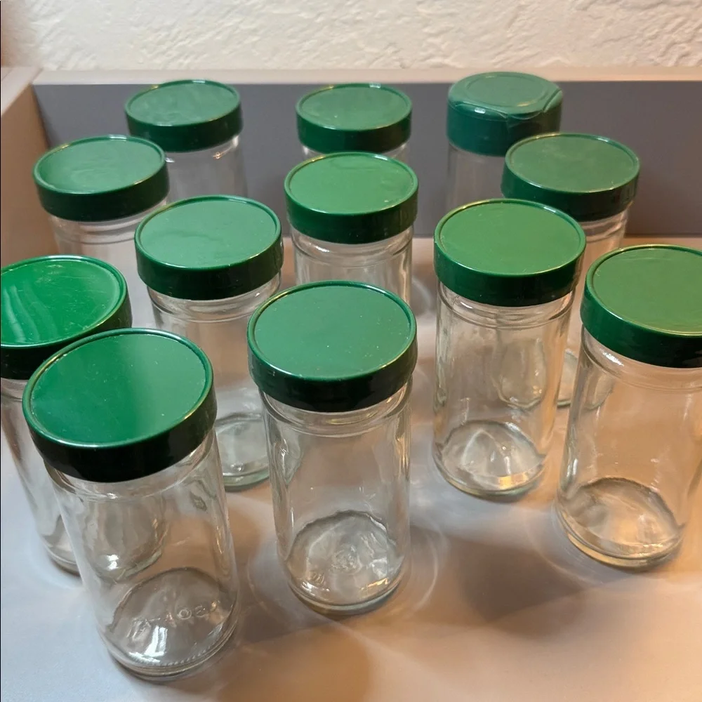 Set of 12 Vintage Glass Round Spice Jars W/ Green Lids, Approximately 4.5” Tall - Picture 7 of 8